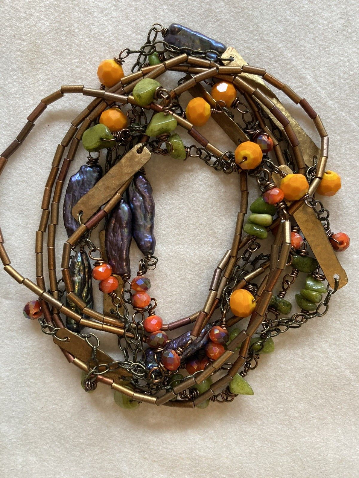 Artisan crafted long beaded necklace orange gold green purple chain wrap around