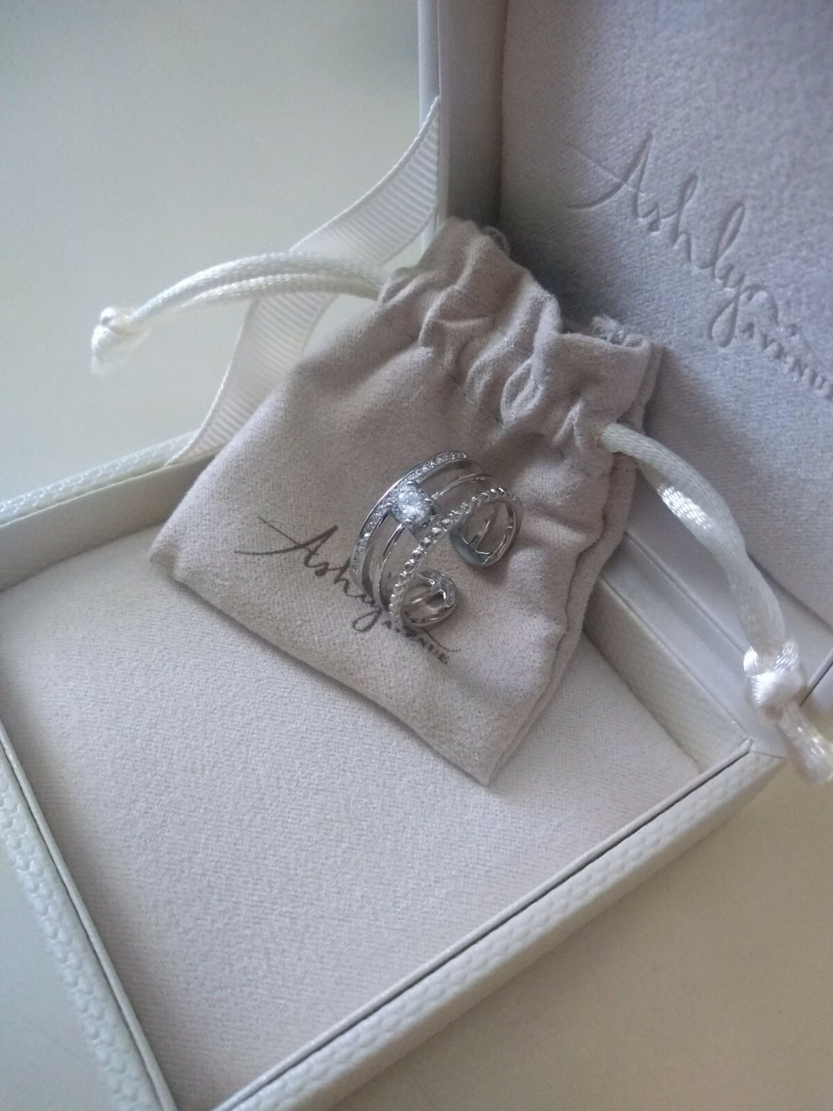 Ashlynn Avenue Aurora White Gold Trio Wrap Ring with Center Stone Size 6