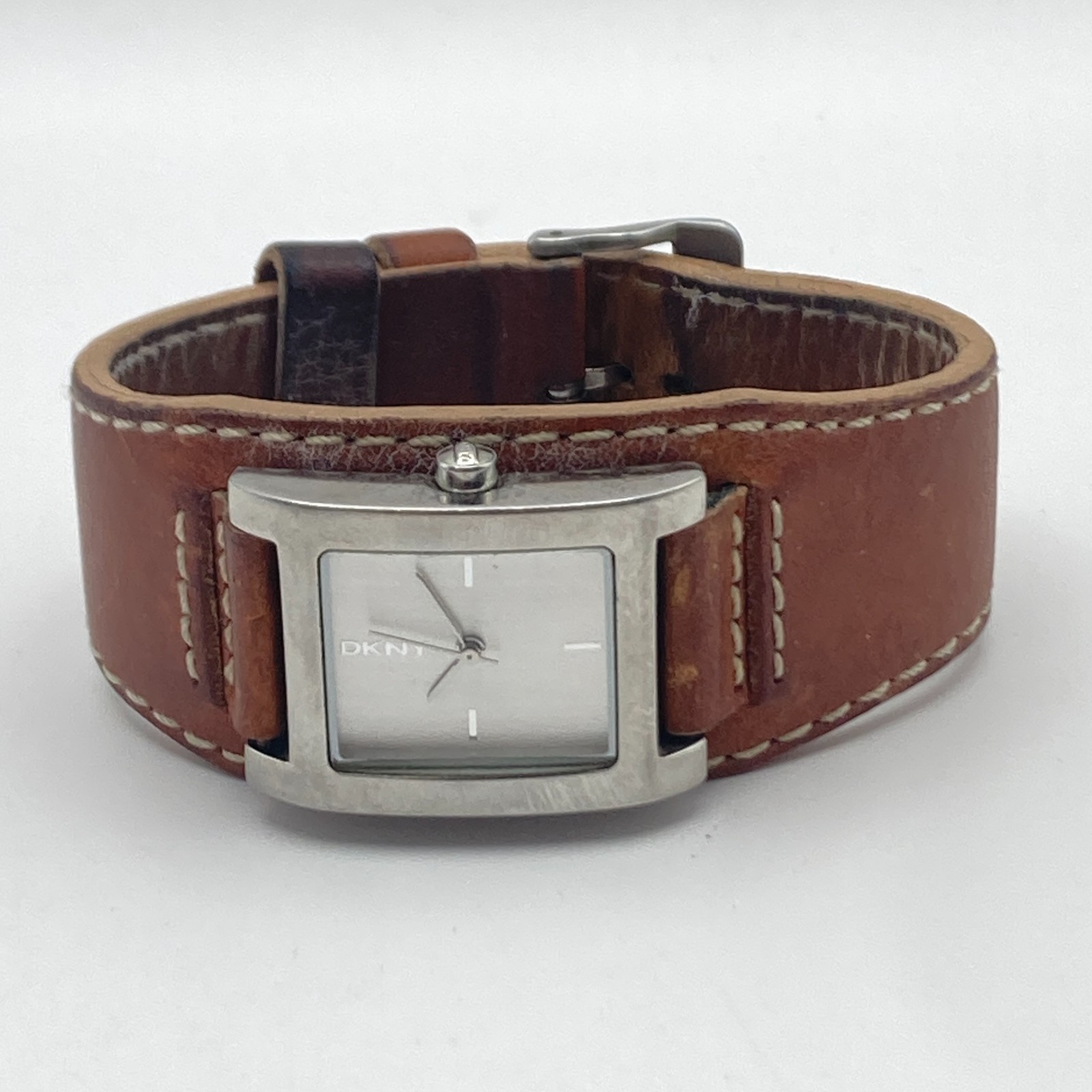 DKNY Women’s Watch 24mm Silver Tone Brown Leather Cuff 30M Tank New Battery 8″
