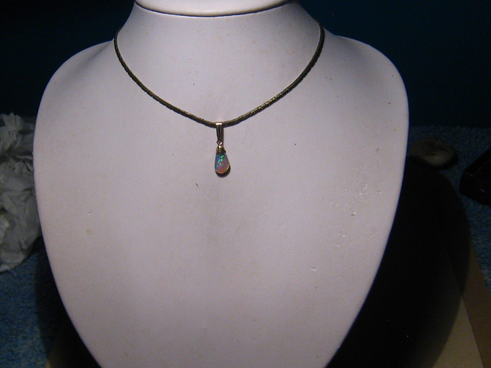 .90 ct. small Bright Opal Pendant , Solid 14 k yellow gold