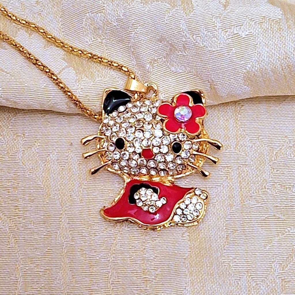 “Hello Kitty” cat pendant necklace Red & black enamel, silver rhinestones