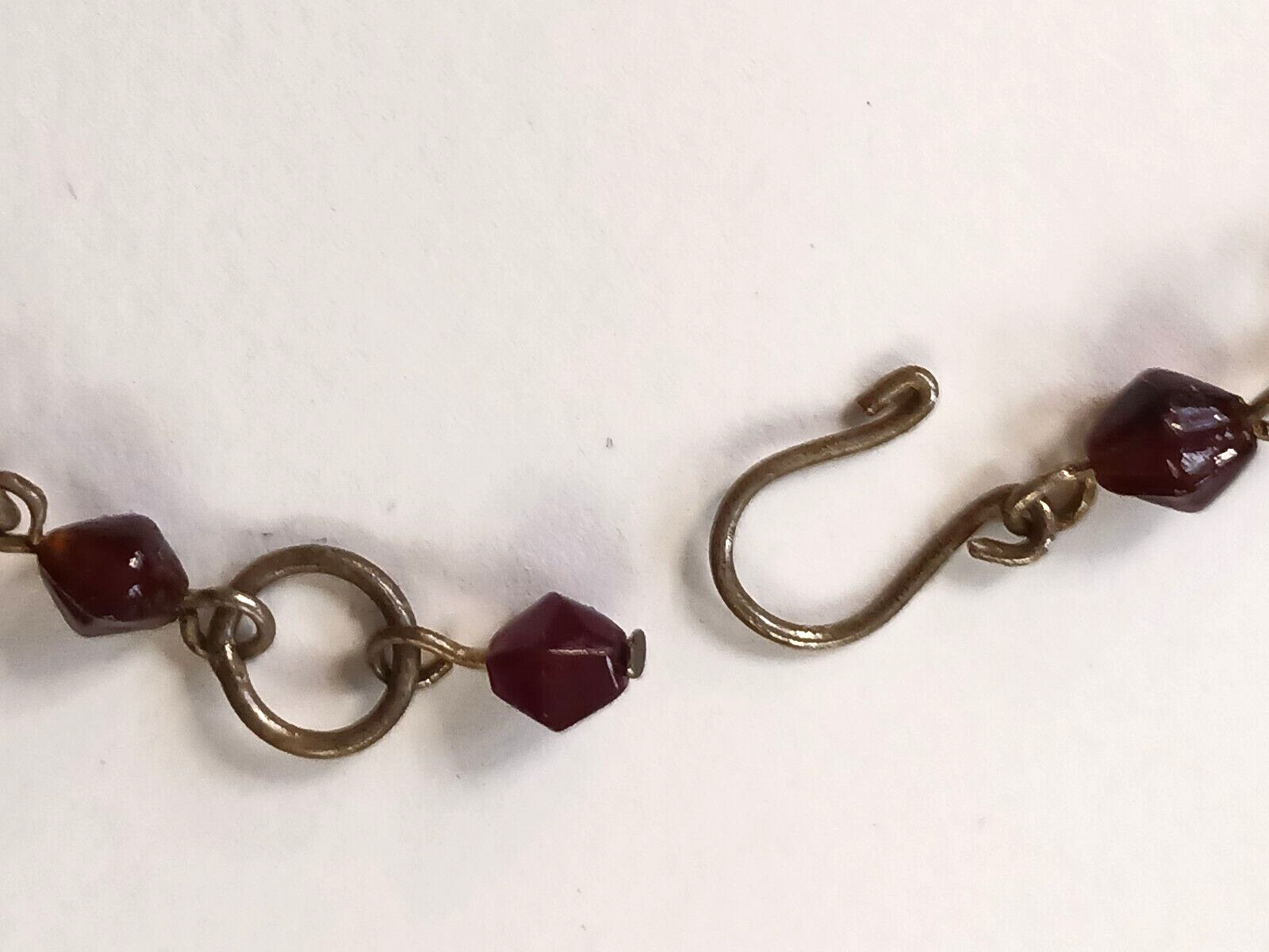 Beautiful silver tone necklace with flowers and red stones. hook clasp. Vintage
