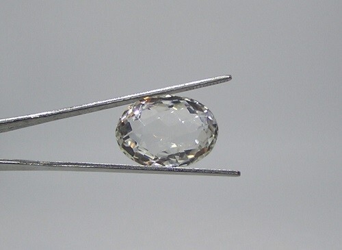 Faceted Rock Crystal Quartz Gemstone, 58.85 Carats, 29 X 21.5 X 15 mm Oval