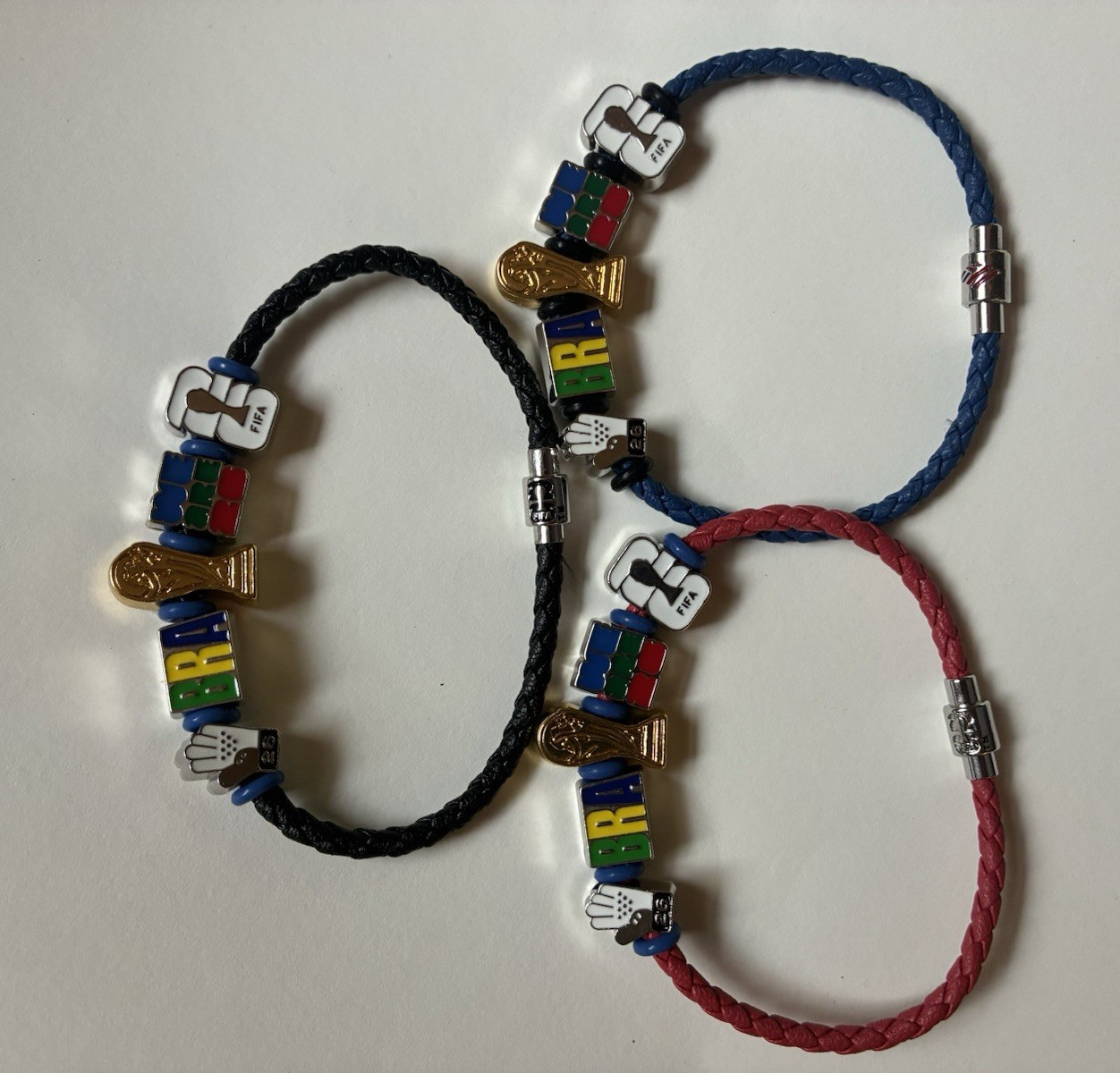 BofA FIFA Brazil red, black, and blue large 9 1/2”and small 7 1/2”. 15 in stock