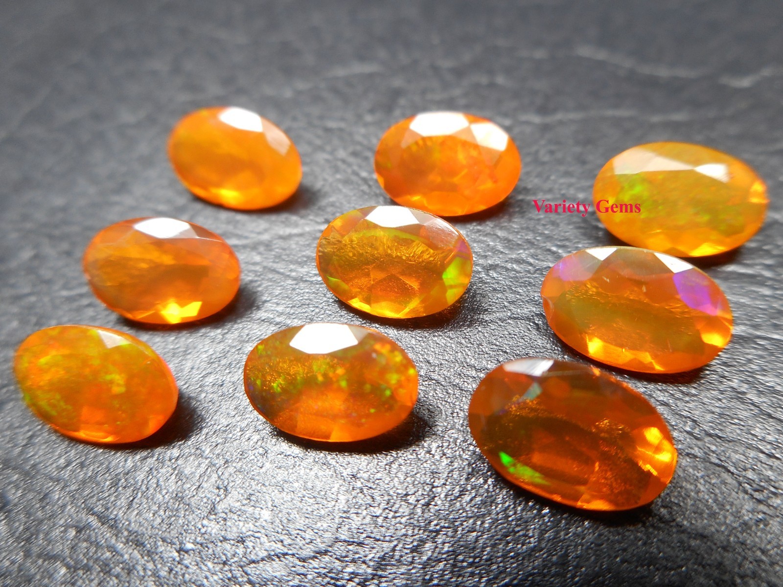 Faceted Orange Ethiopian Opal 4 pcs lot : Oval Gemstone (3×5, 5×7, 6×8 mm)