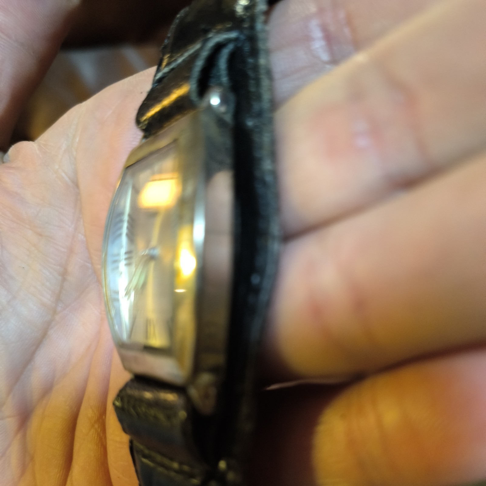 Silver Tonneau Quartz Wristwatch Roman Numerals Black Leather Strap Analog