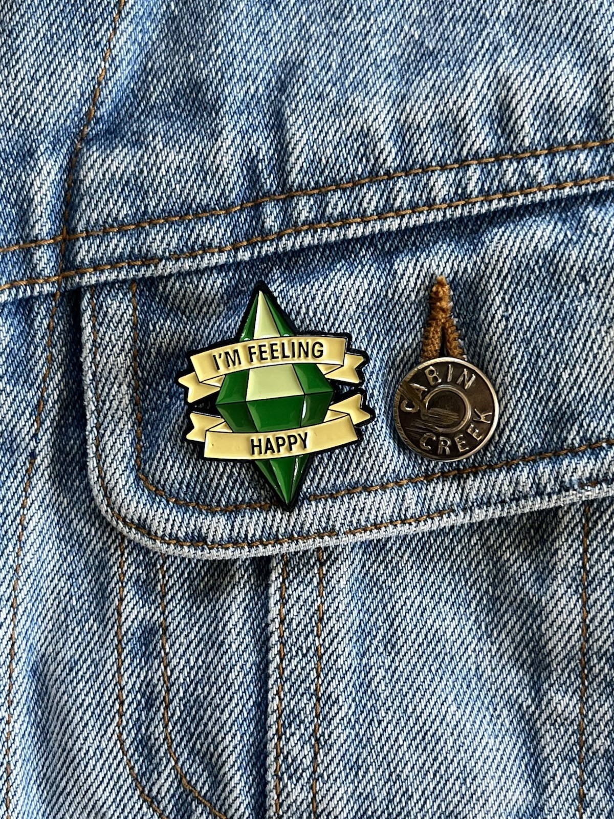 The Sims – PlumbBomb Icon “I’m Feeling Happy” Simlish Video Games Enamel Pin