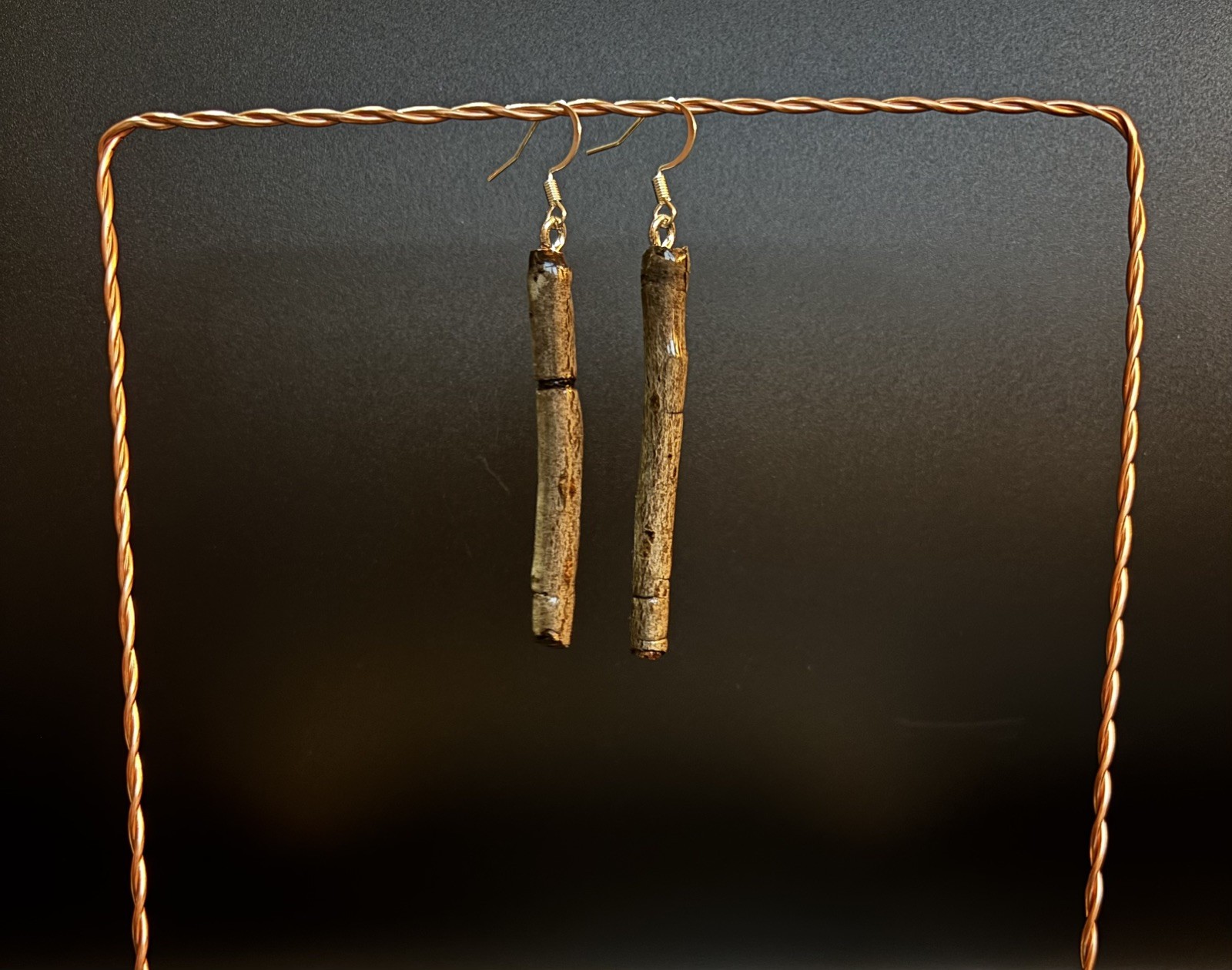One of a kind jewelry made from real pieces of wood coated in resin