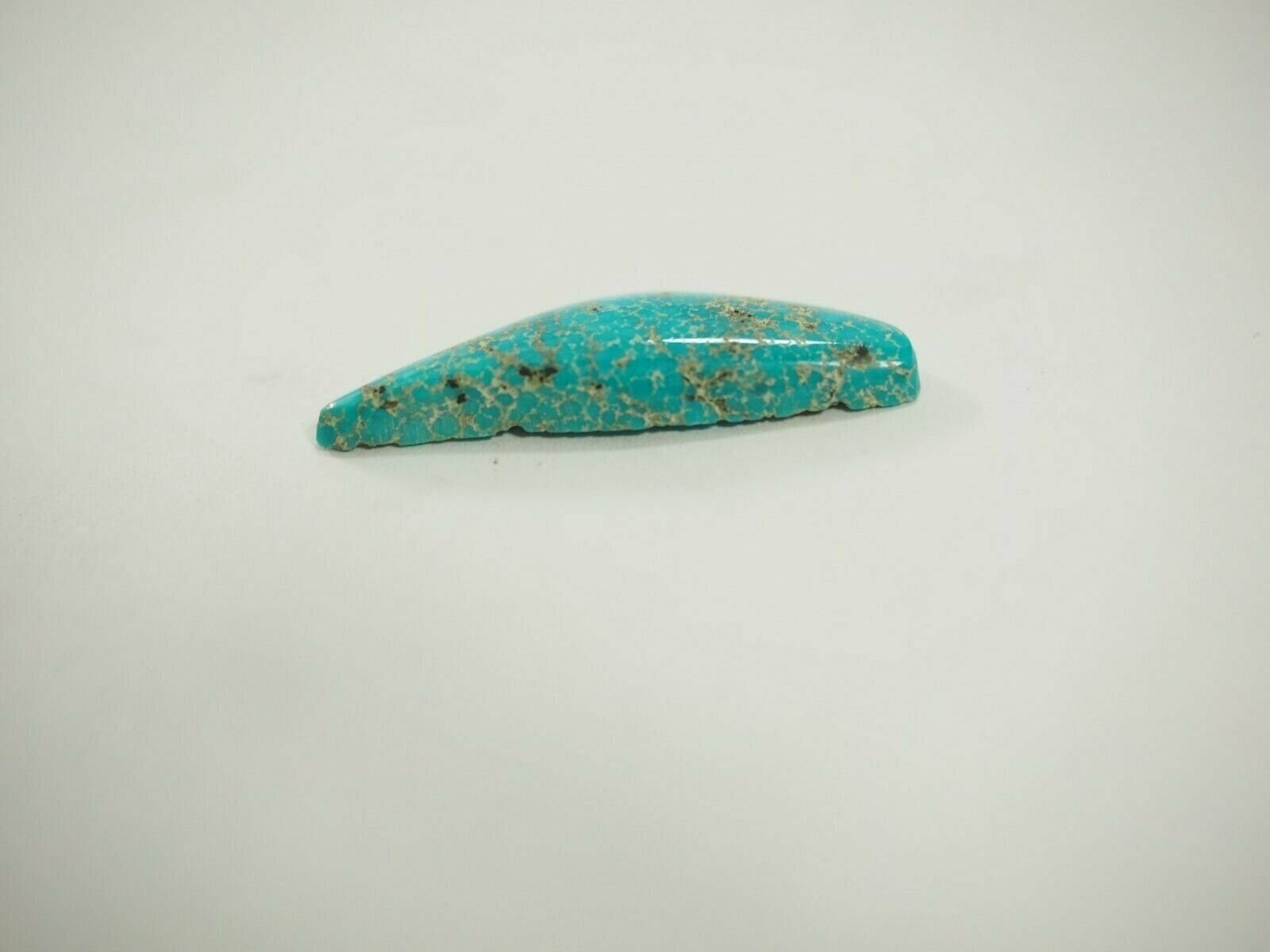 8.37 carat Turquoise Mountain freeform Cabochon 30.4 x 9.4 x 4.3 mm TC-58