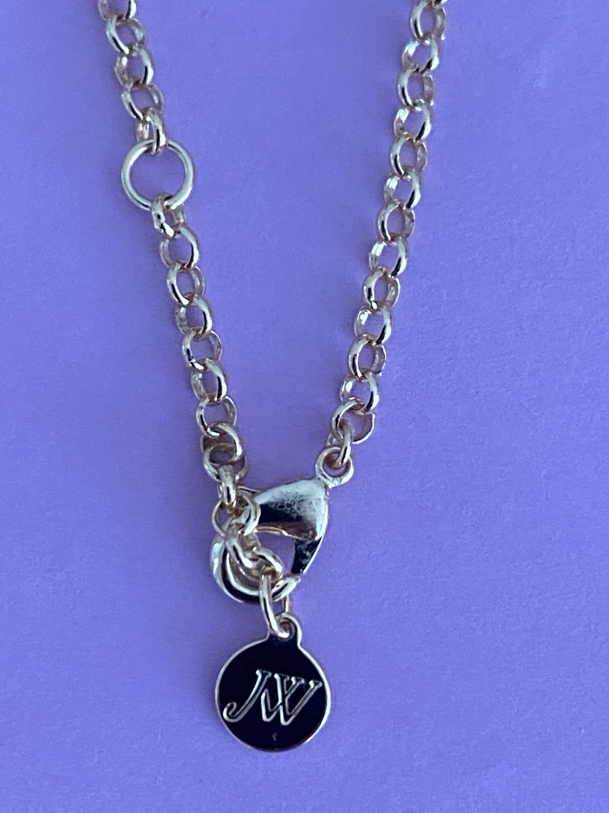 Jane Win “Free” Mother of Pearl Butterfly necklace.