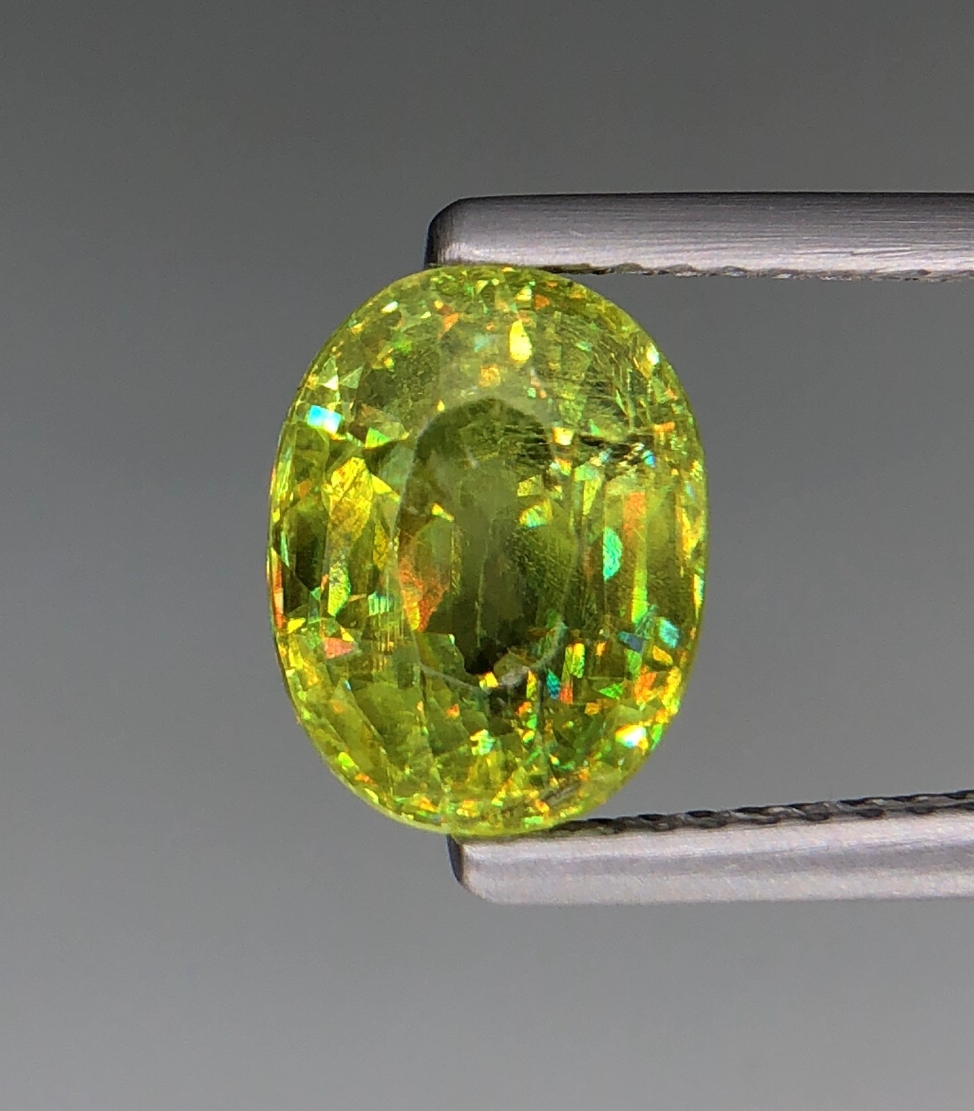 3.15 Ct Natural Faceted Full Fire Sphene / Titanite Oval Cut Loose Gemstone