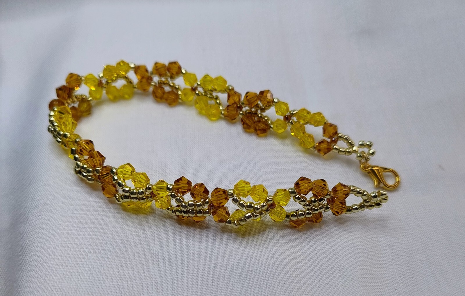 Handmade Beautiful Butterfly design bracelet in Honey, Yellow and Gold Colours