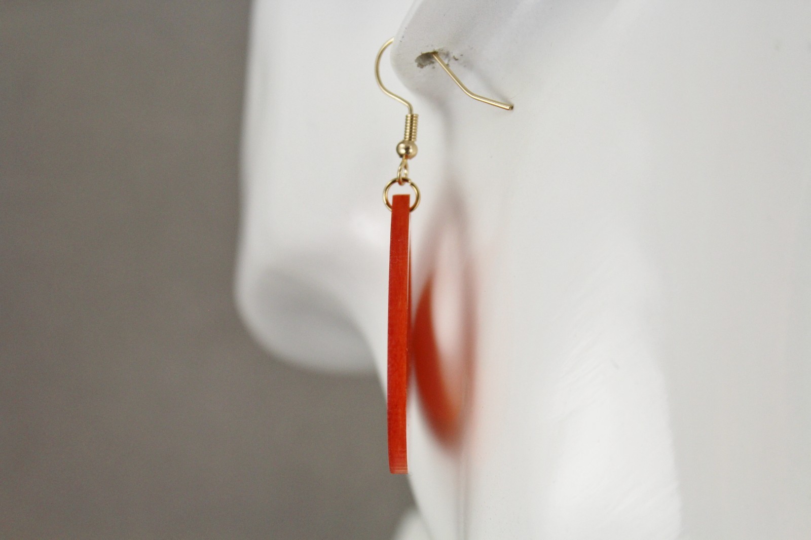 Orange teardrop earrings lightweight dangle cut out oval outline 2.25″ long