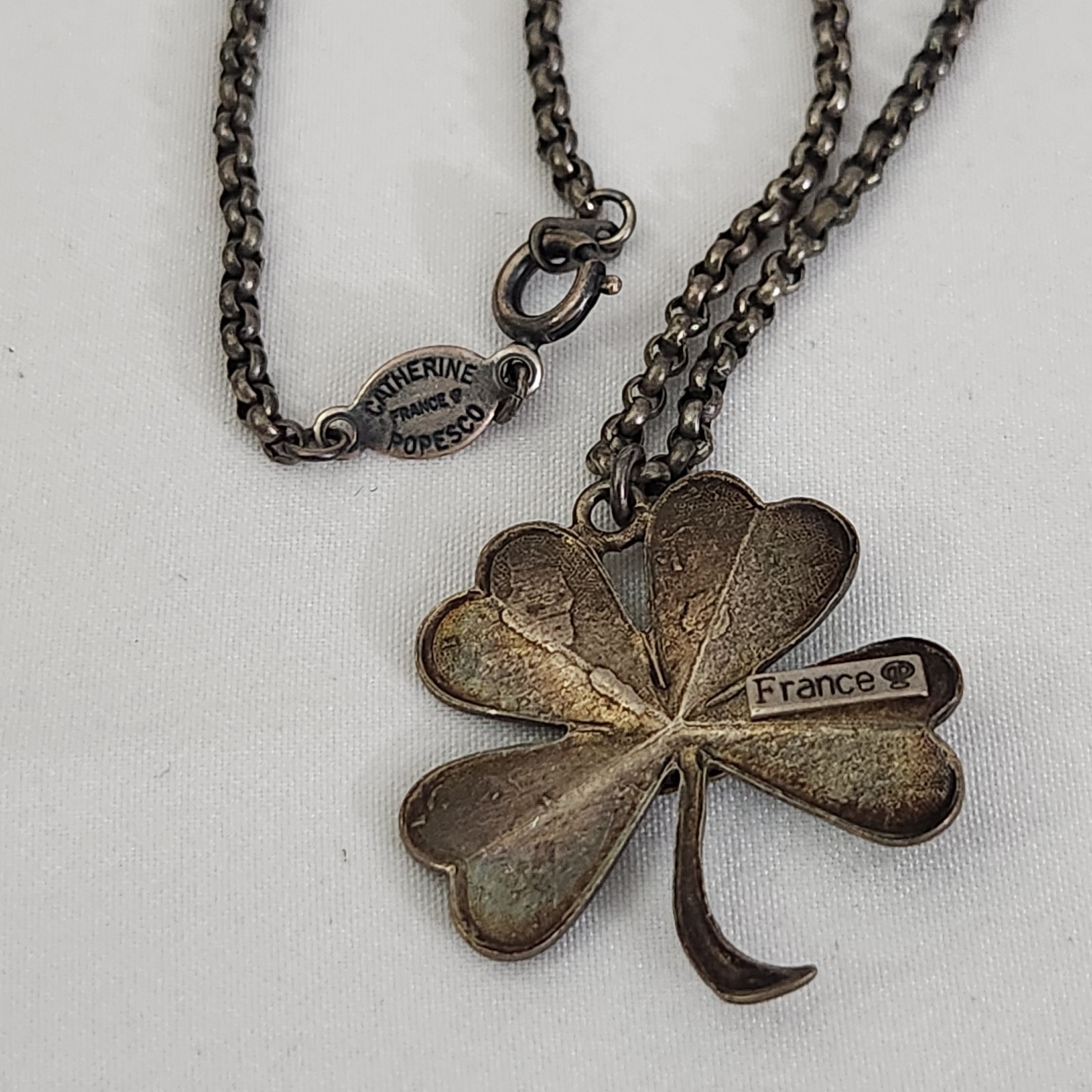Catherine Popesco France Signed Green Enamel Four Leaf Clover w Rhinestone Pearl