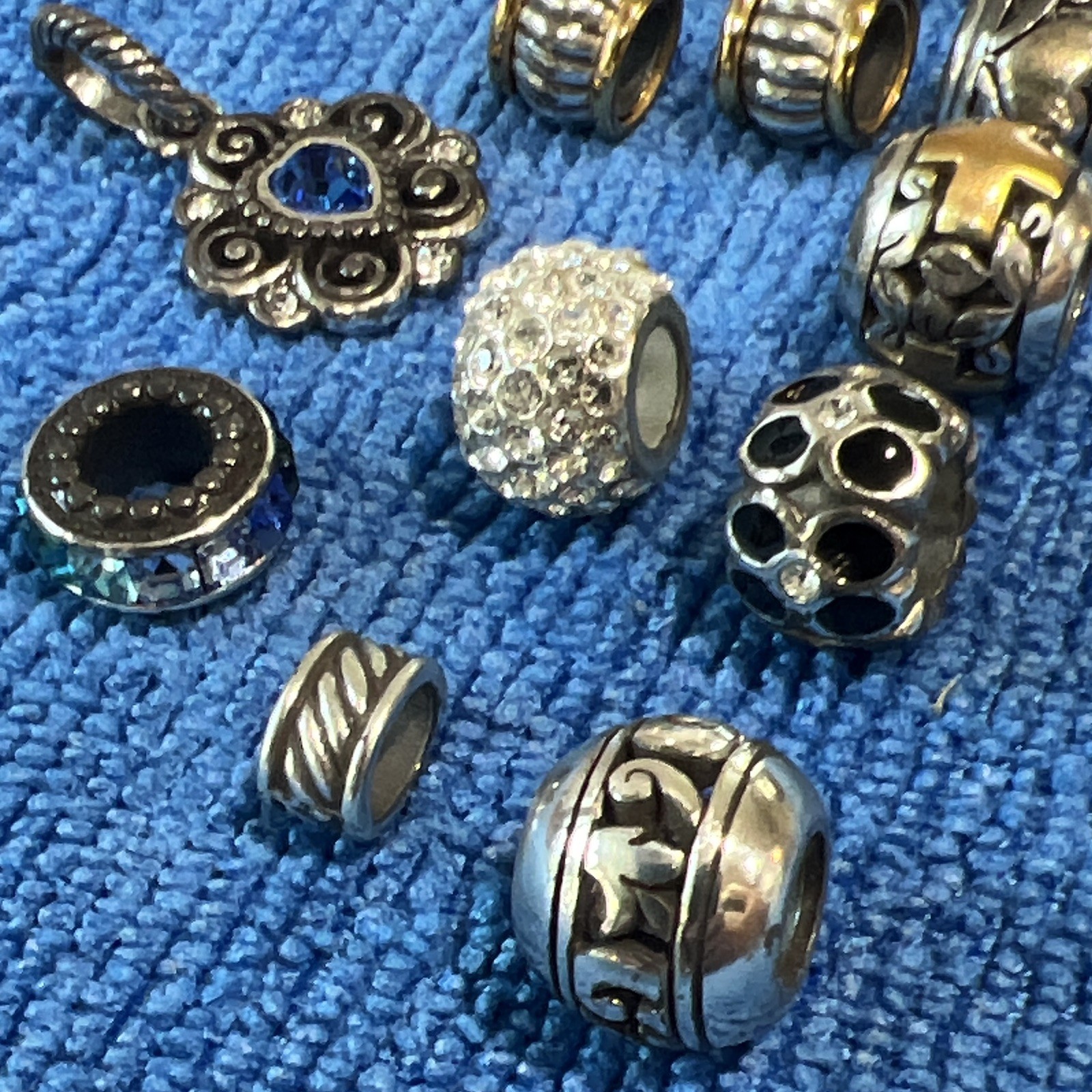 Brighton Charms 12 pieces. Excellent condition 1 mm beads