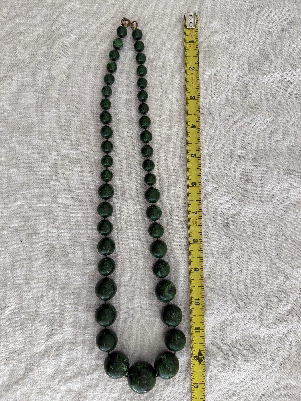 Graduated green plastic resin bead necklace