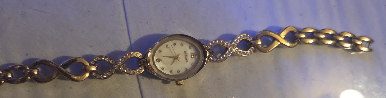 Elgin Women’s Quartz Analog Oval Watch Blue Dial Gold Tone Bracelet