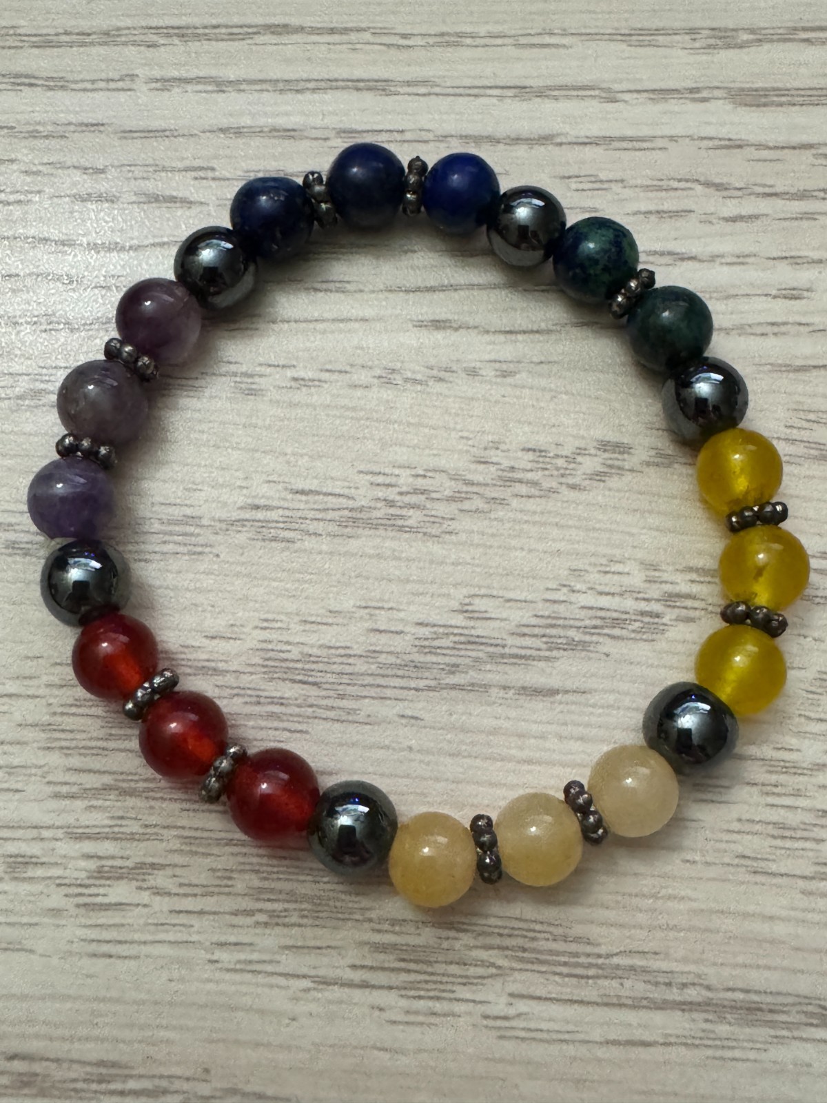 Chakra Beaded Bracelet Approx 8″ stretchable with Silver Toned Accent Beads