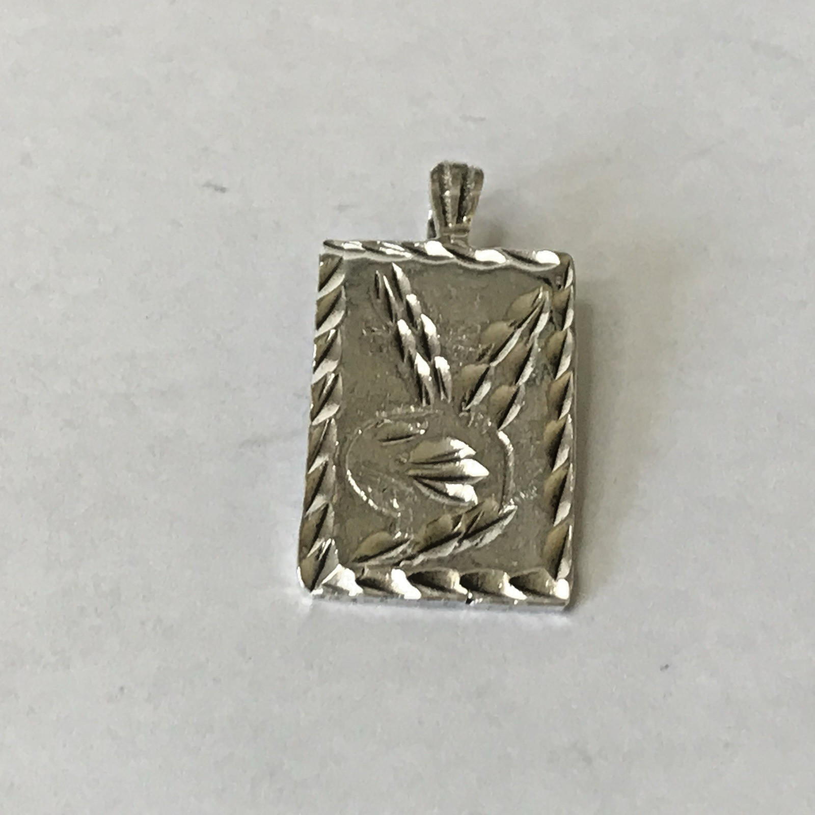 vintage Sterling Silver Playboy Pendant 3grams