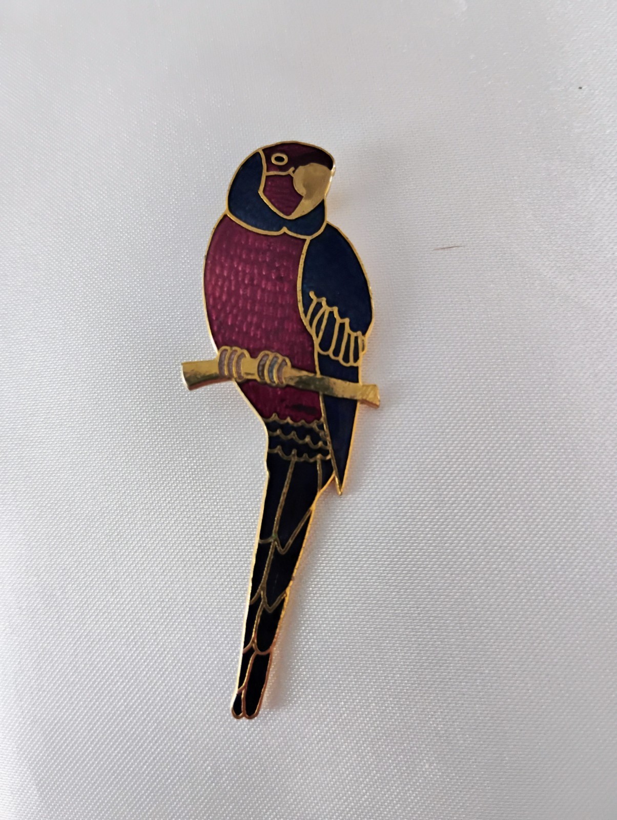 This vintage parrot brooch is from the Laurel Burch “Cezanne” collection
