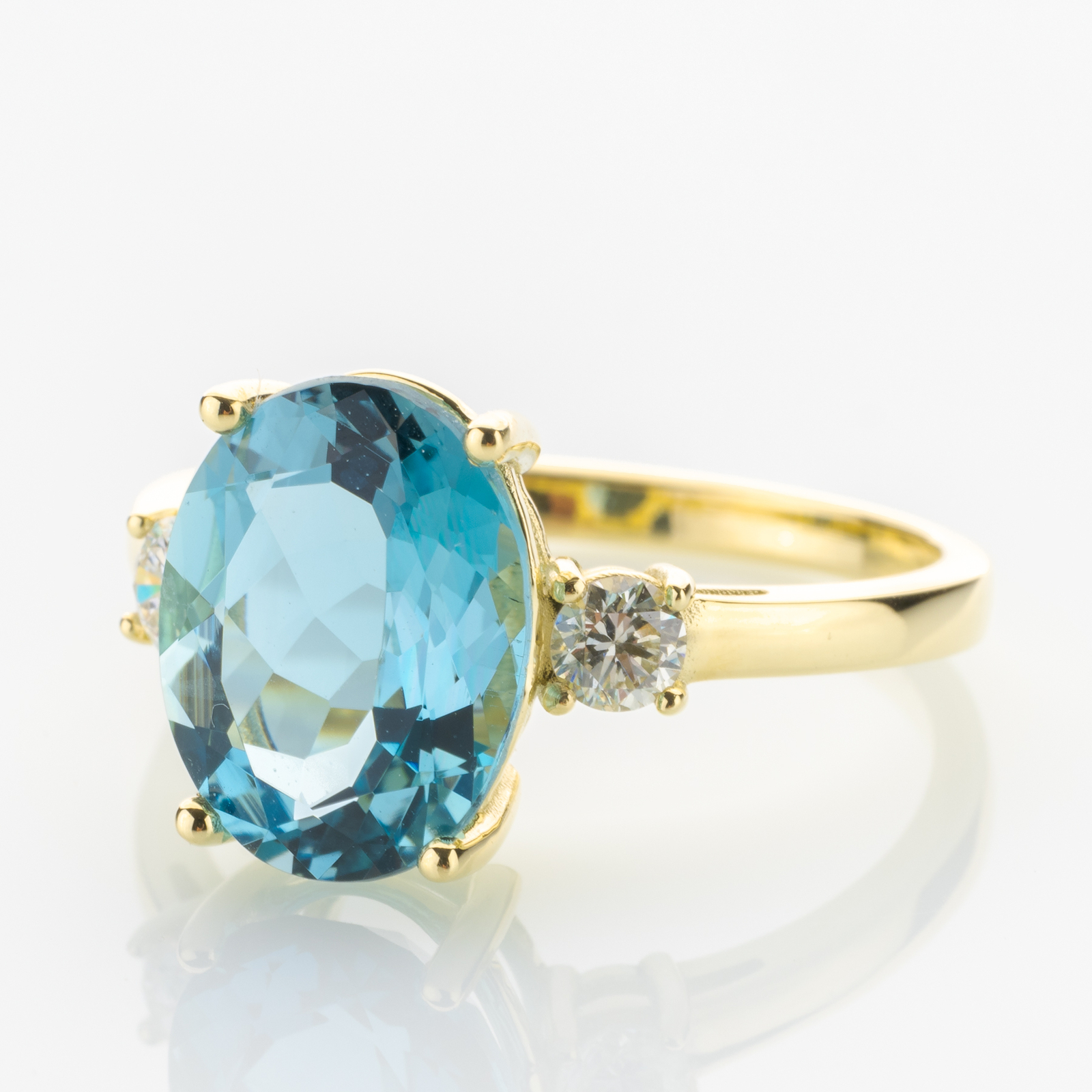 14k gold ring with an aquamarine and diamonds