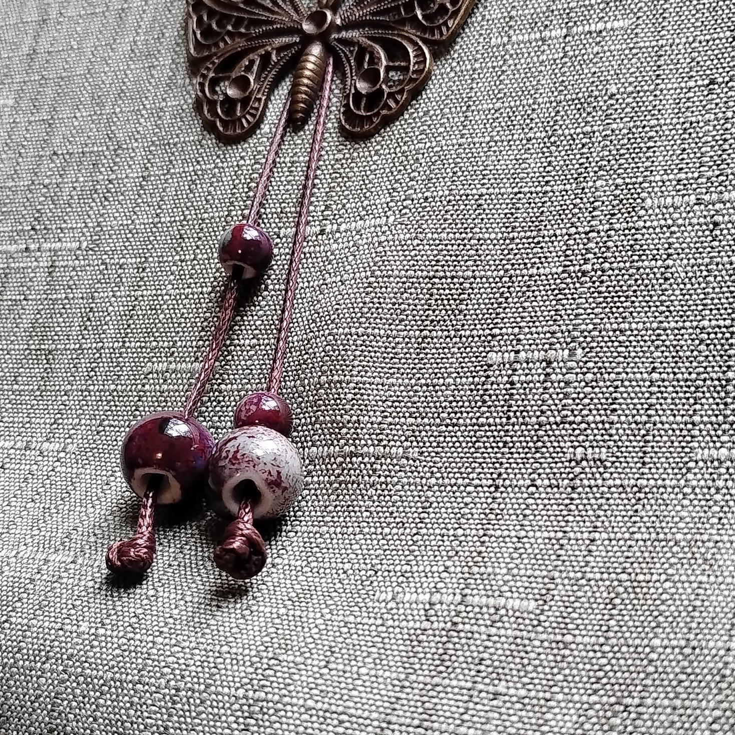 Purple Glass Beaded Cord Necklace Butterfly Charm. 3099
