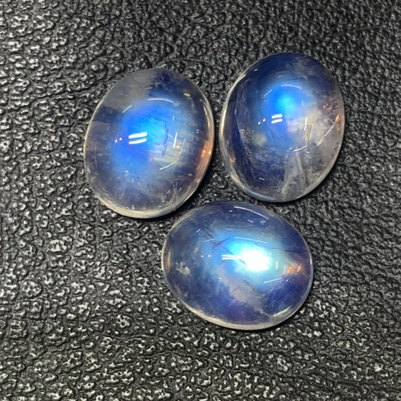 AAAAAA Quality Rainbow Moonstone Blue Fire Oval Shape Cabochon Size 10X12 MM