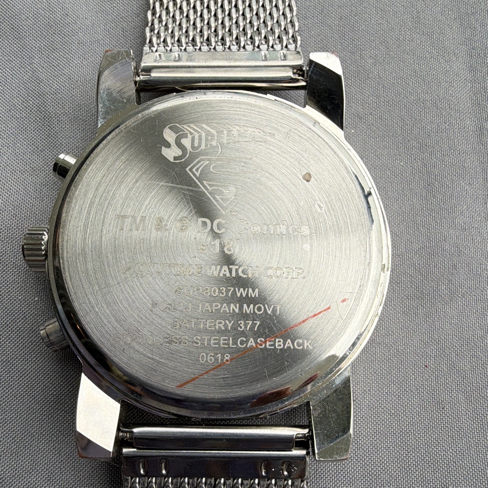 DC Comics Superman Quartz Analog Silver Tone Logo Dial Stainless Steel Mesh