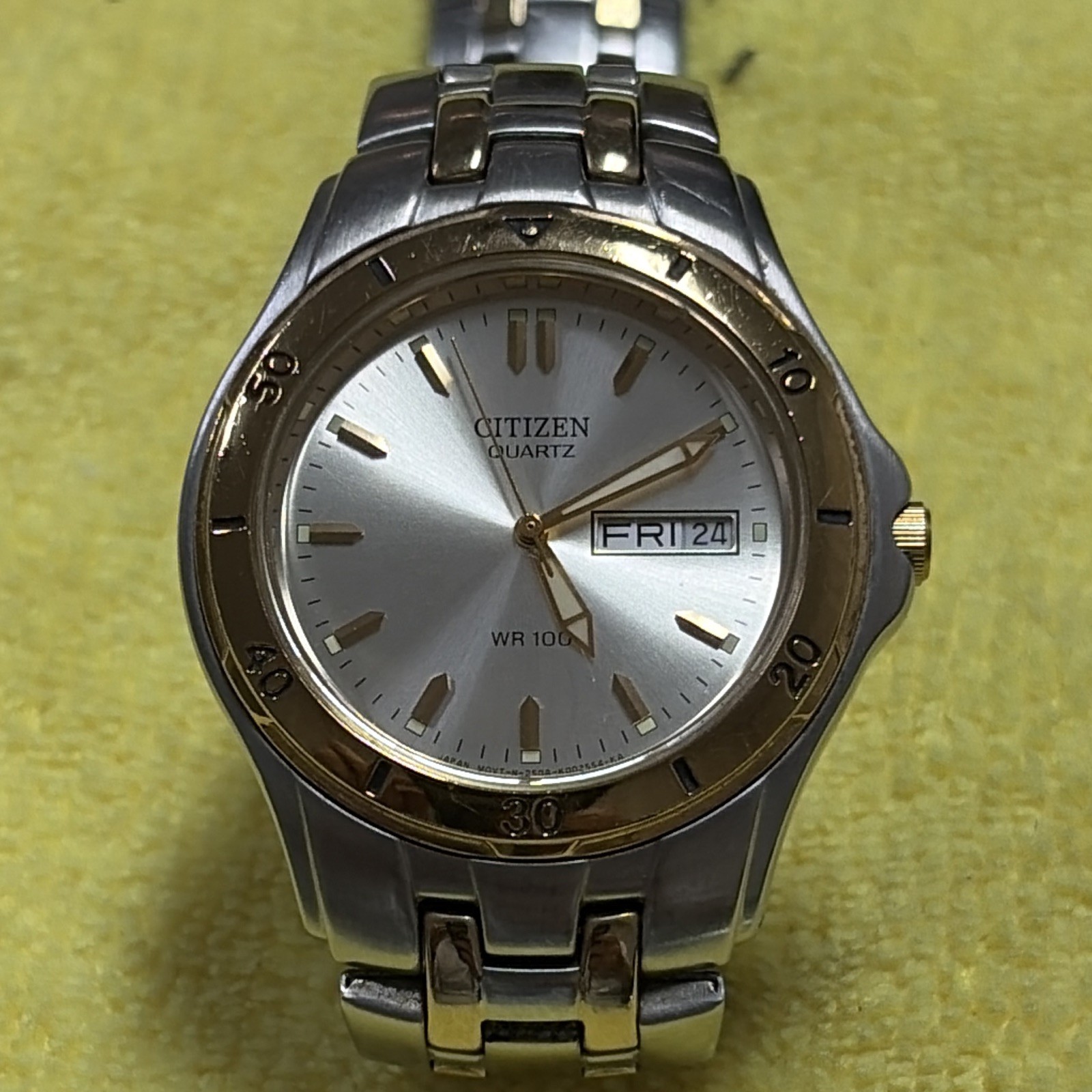 Citizen Quartz Day/Date WR 100m Two-Tone Silver Sunburst Dial 34mm Bracelet