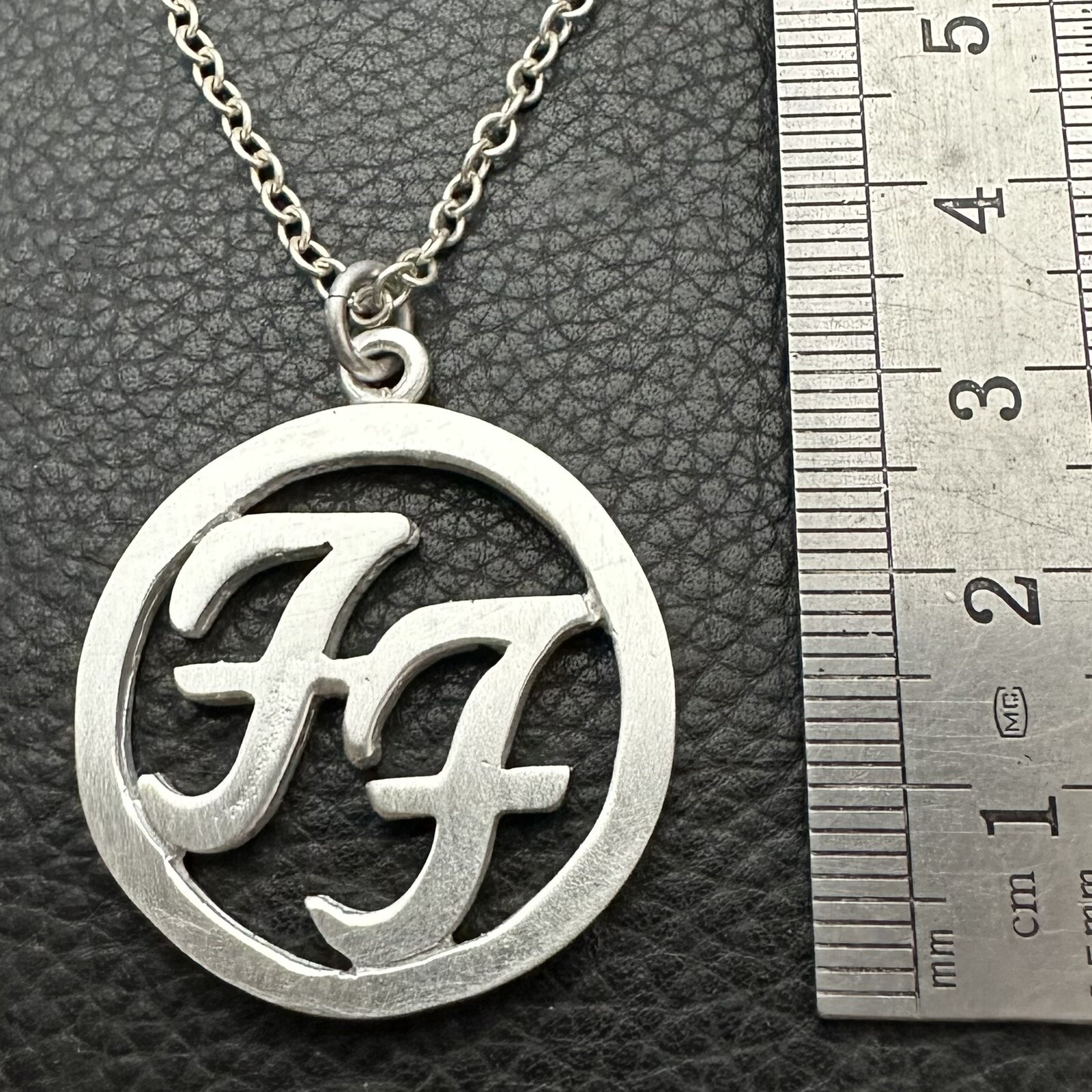MJG STERLING SILVER FOO FIGHTERS PENDANT. CIRCLE. WITH CHAIN. DAVE GROHL