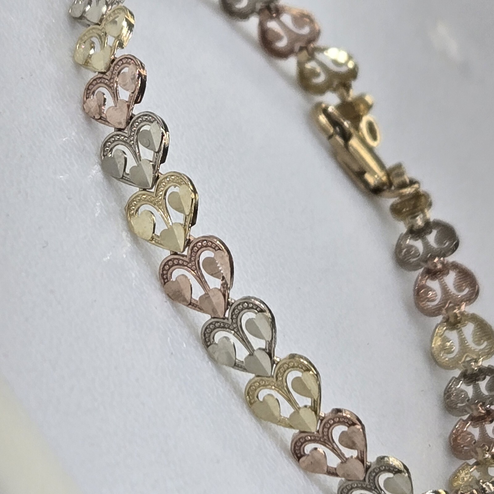 Womans tri color diamond cut 10k yellow white rose gold hearts Bracelet 7.25″