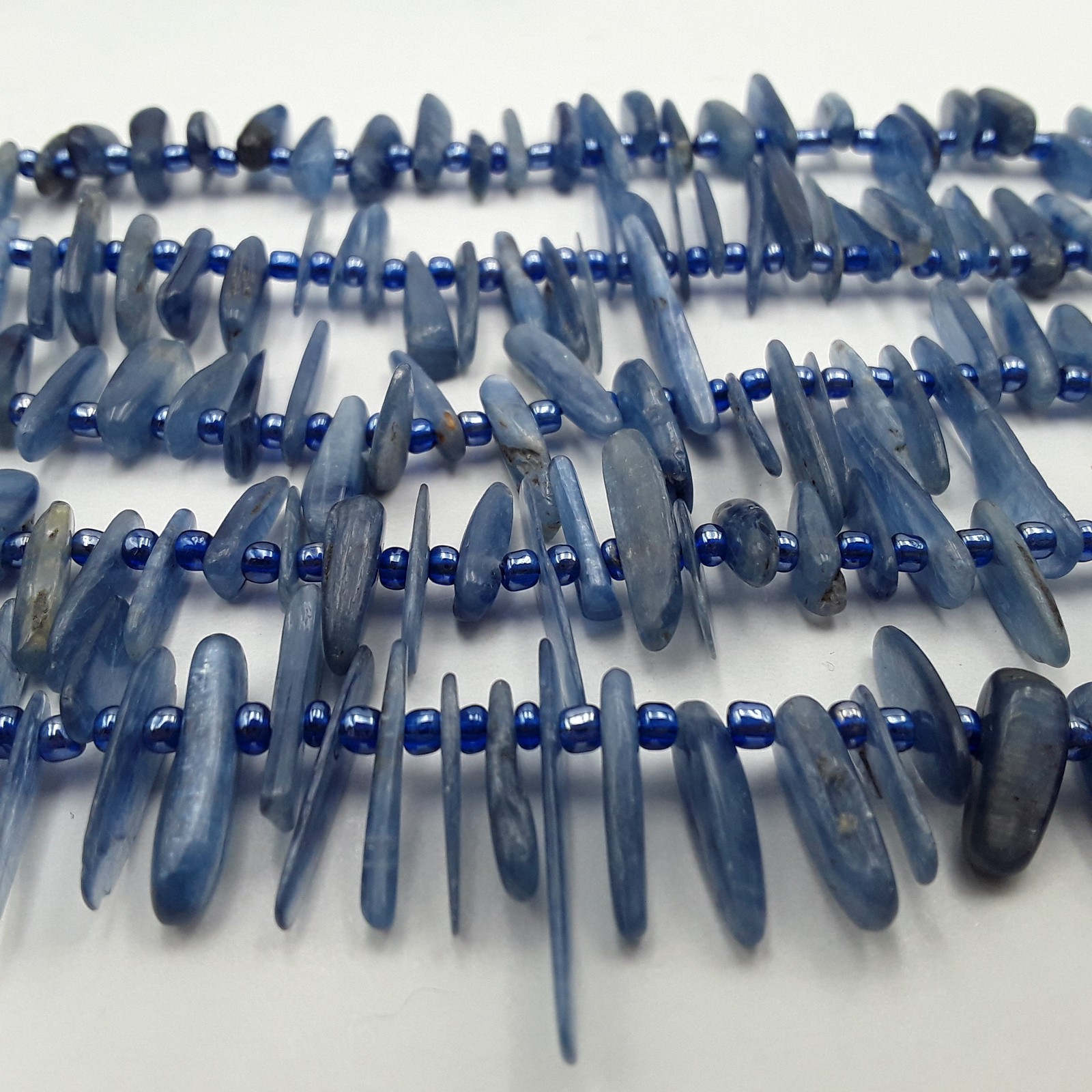 Kyanite Graduated Pebble Slice Stick Points Beads Approx 15-30mm 15.5″ Strand