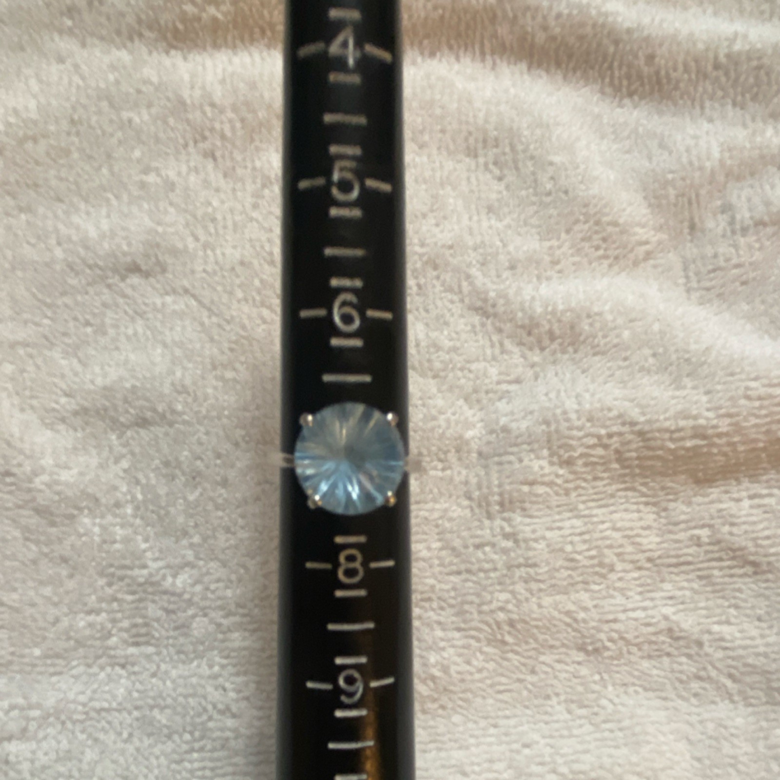 Round blue topaz petal prong, silver tone size 7