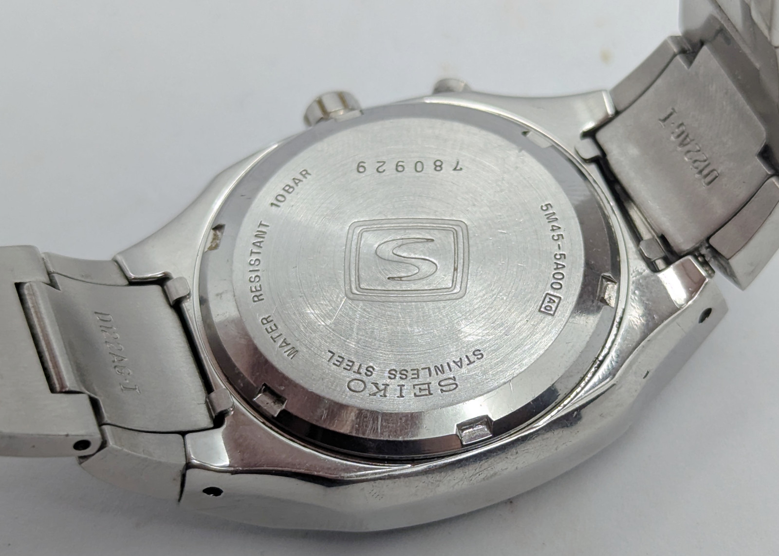 Seiko Kinetic 5M45 R-SUS GMT Black Dial Integrated Bracelet | New Capacitor