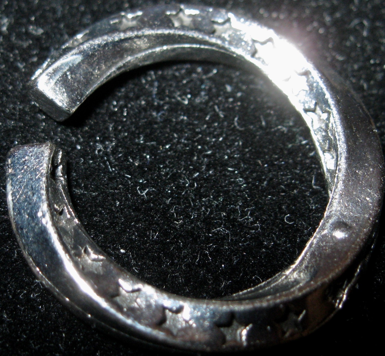 “BEAUTIFUL 925 STERLING SILVER EAR CUFF. STAMPED 925 AND LOADED WITH STARS”