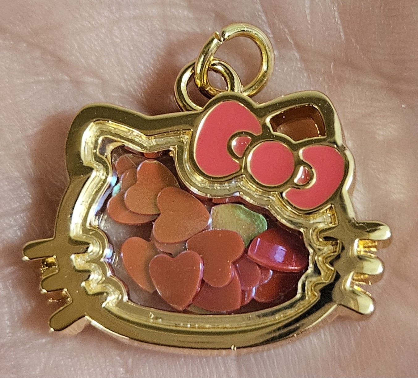 SANRIO HELLO KITTY GOLD TONE HEART CONFETTI SHAKING GLASS PENDANT CHARM