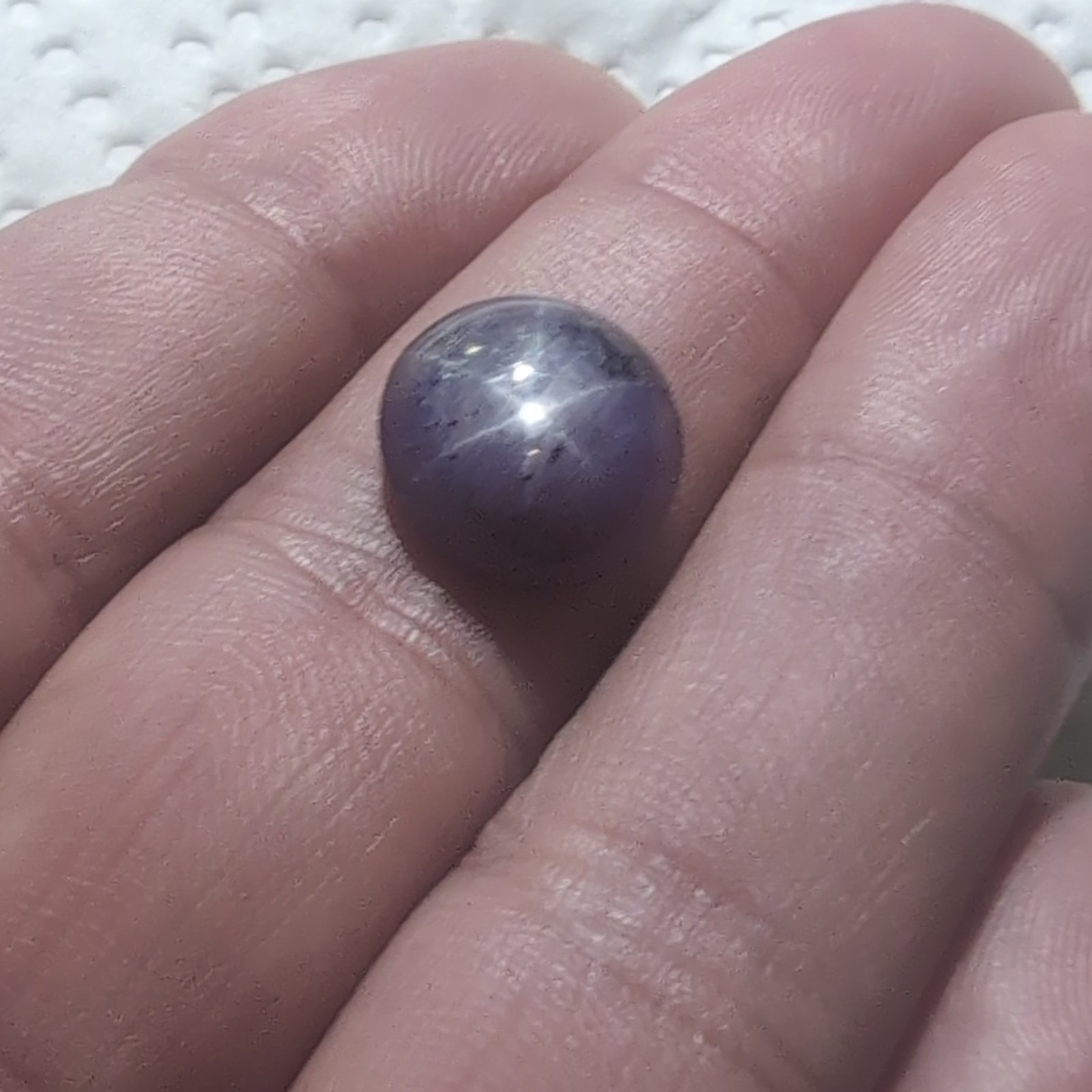 Purple Star Sapphire Found In Franklin N.C. 9.5 Carat Glows Under Blacklight.