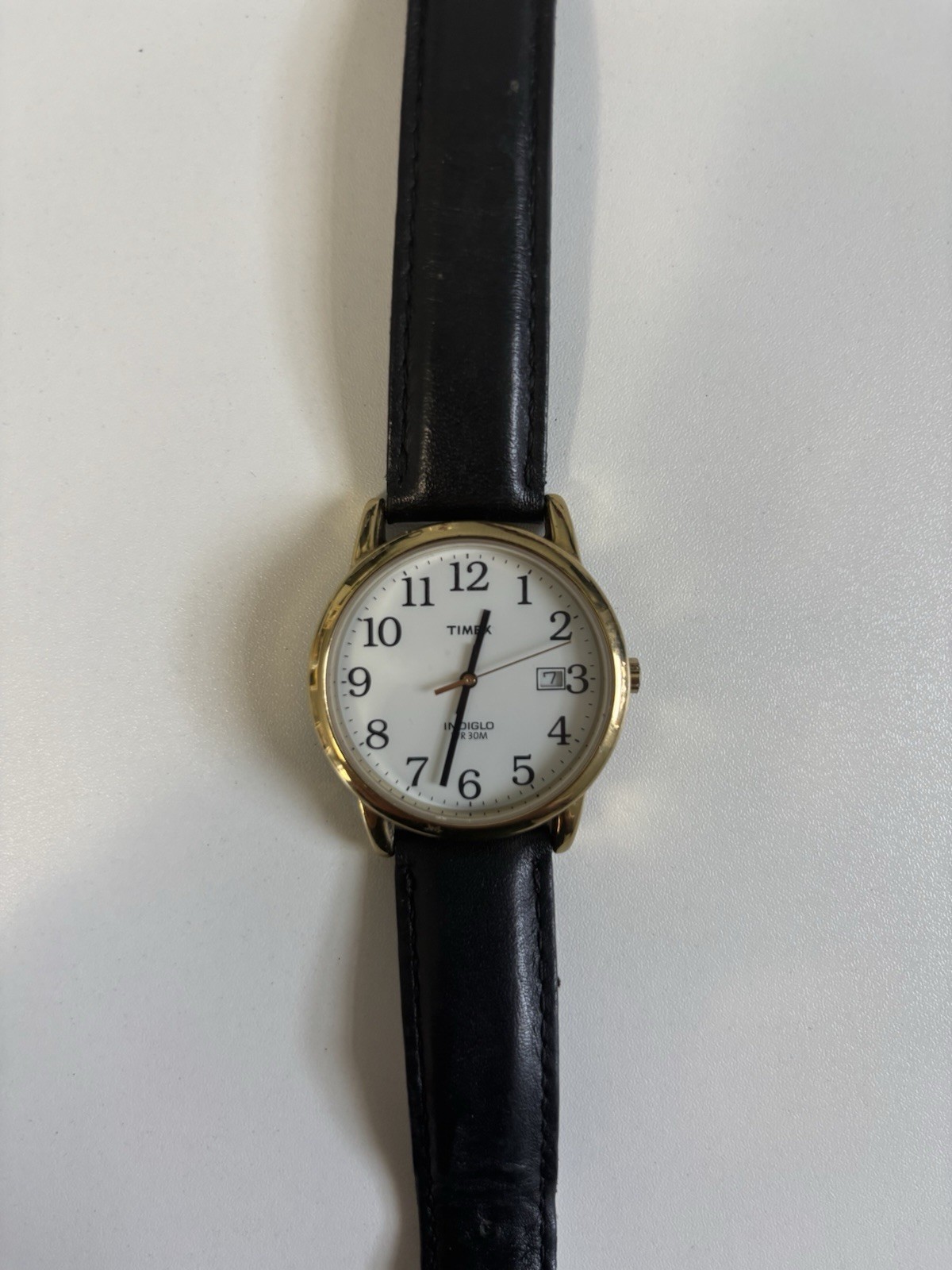 Timex Easy Reader Indiglo Date Gold Case White Dial Black Leather Band T2H291