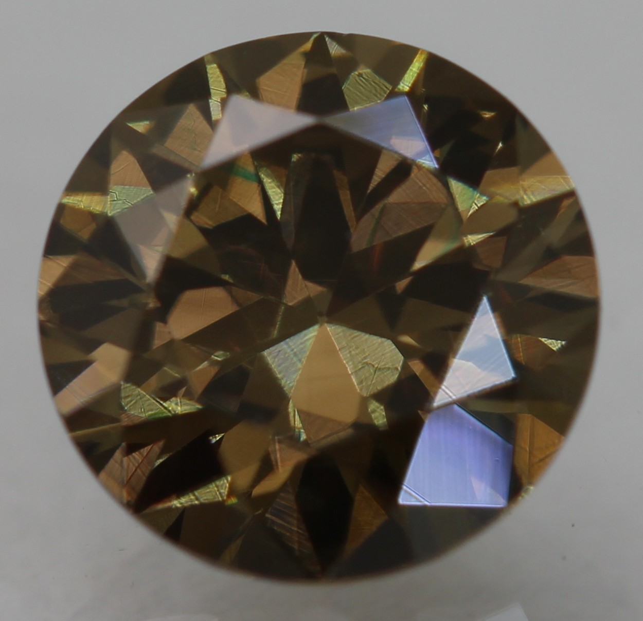 Cert 0.59 Carat Yellow Brown VVS1 Round Brilliant Natural Enhanced Diamond 5.51m