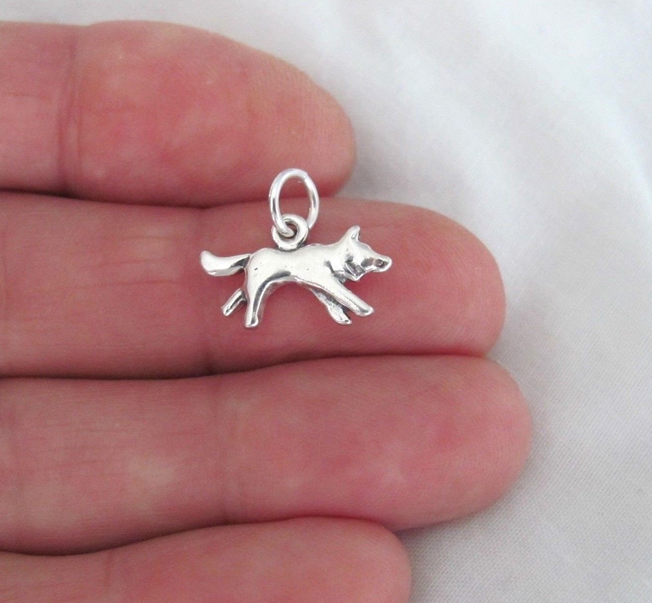 Sterling Silver western style wolf satin finish charm