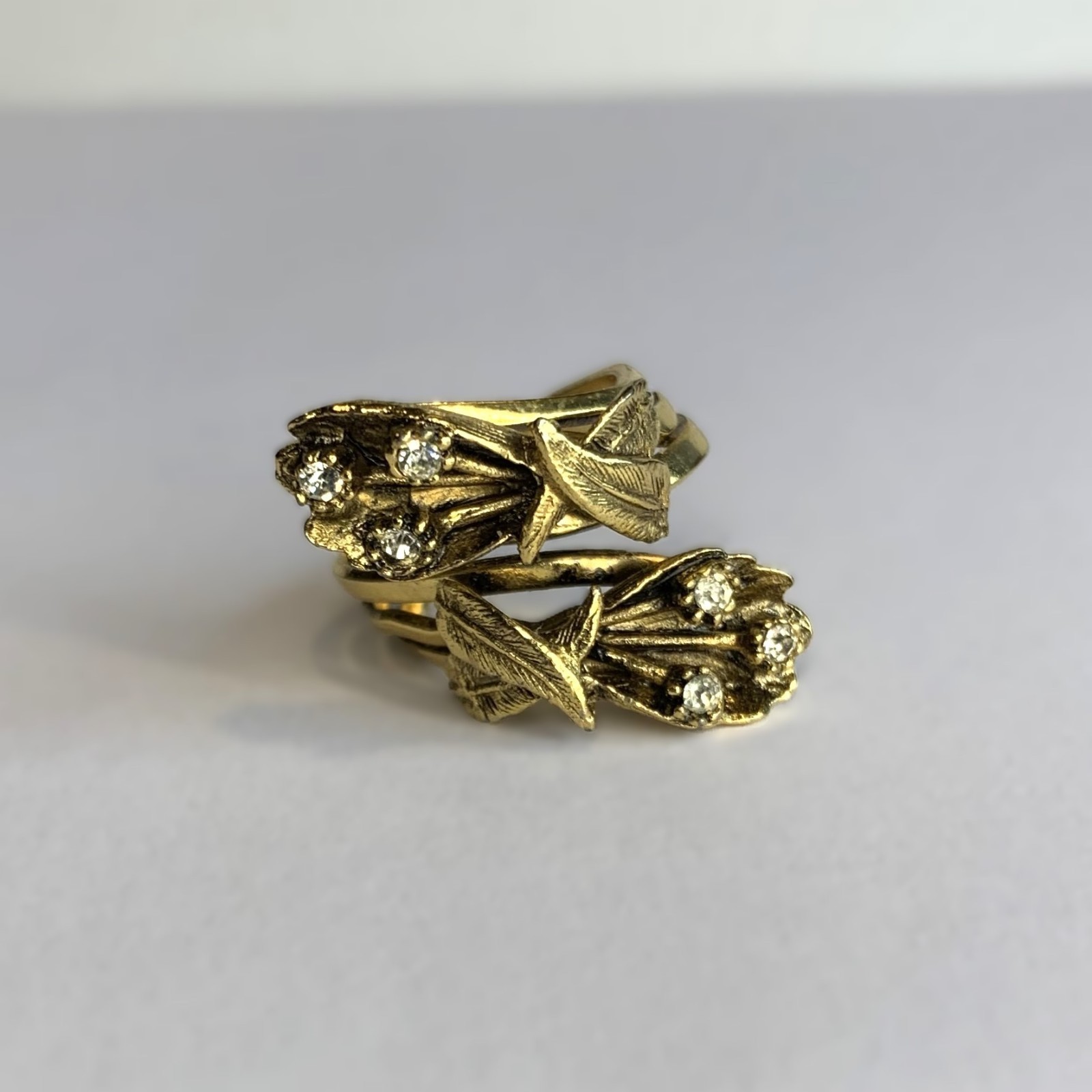 Vintage Gold Tone Leaves Clear Rhinestone Bypass Cocktail Ring Size 6.25
