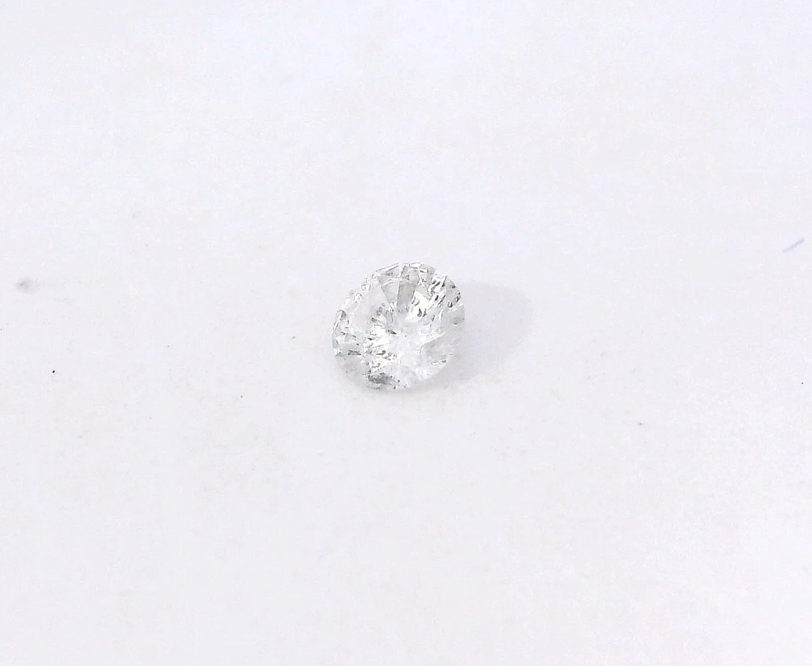 0.16ct Round Brilliant Cut Natural Diamond F, color I1, clarity 3.2 x 1.7 mm