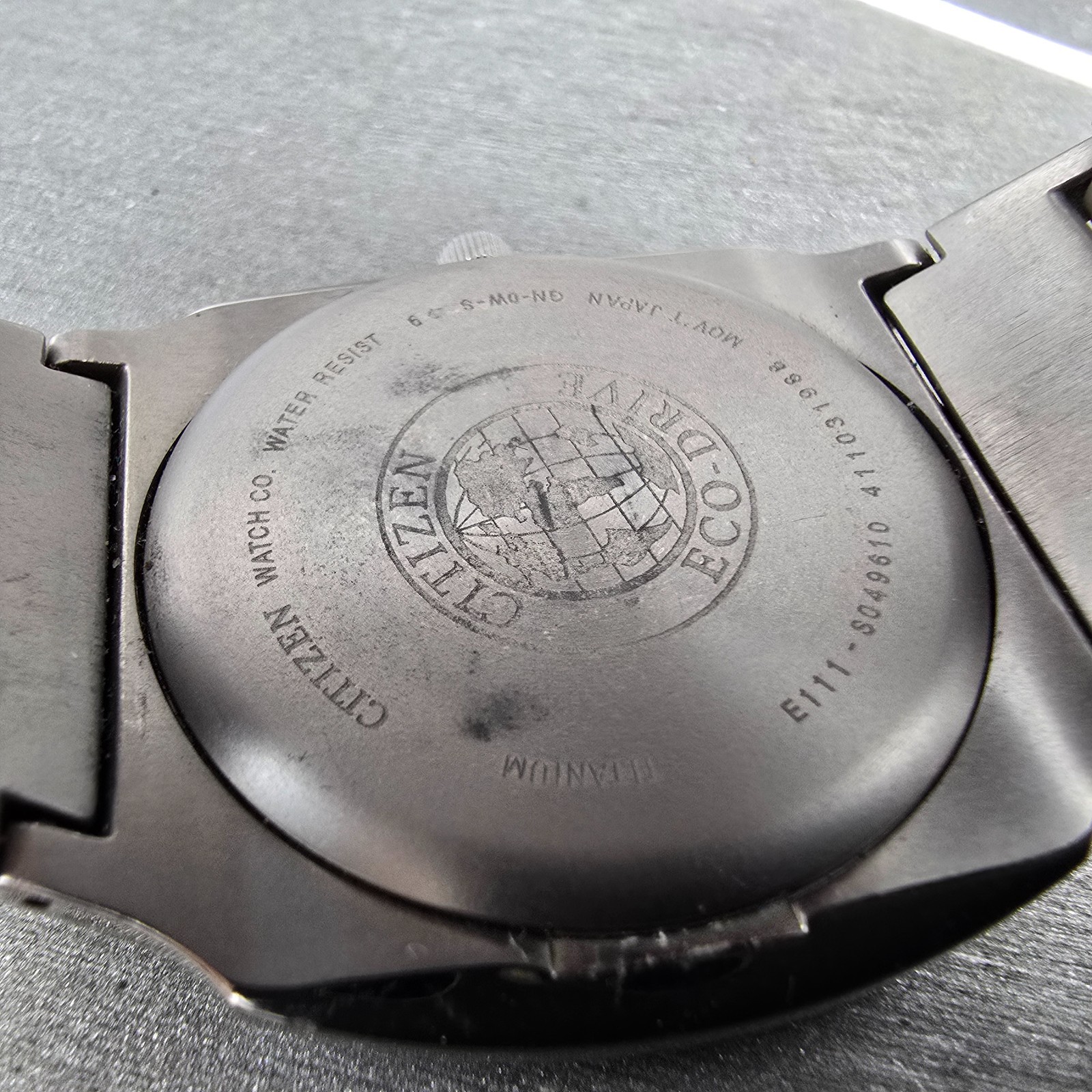 Citizen Eco-Drive Watch Men 38mm Black Dial Titanium Date E111-S049610 Runs EWR