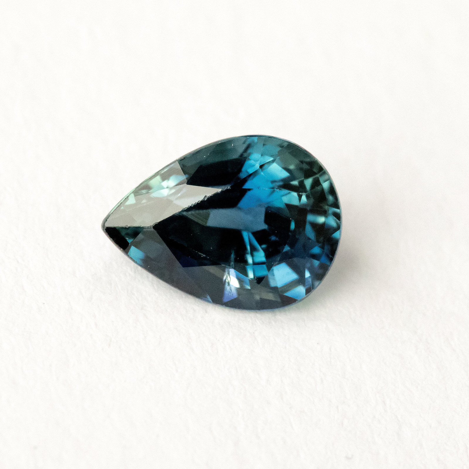 1.35ct Pear Shape Heated Natural Sapphire in Teal Green Peacock Blue Color