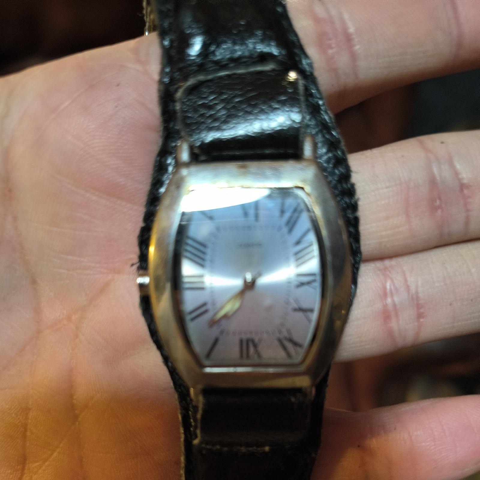 Silver Tonneau Quartz Wristwatch Roman Numerals Black Leather Strap Analog