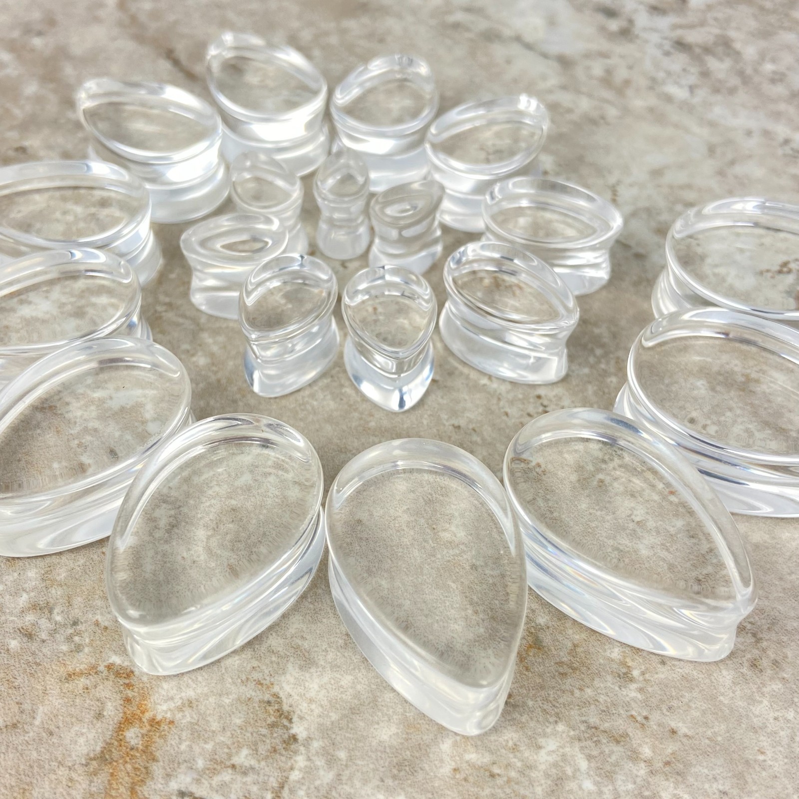 Pair of Clear Glass Double Flare Teardrop Glass Plugs (PG-545) gauges