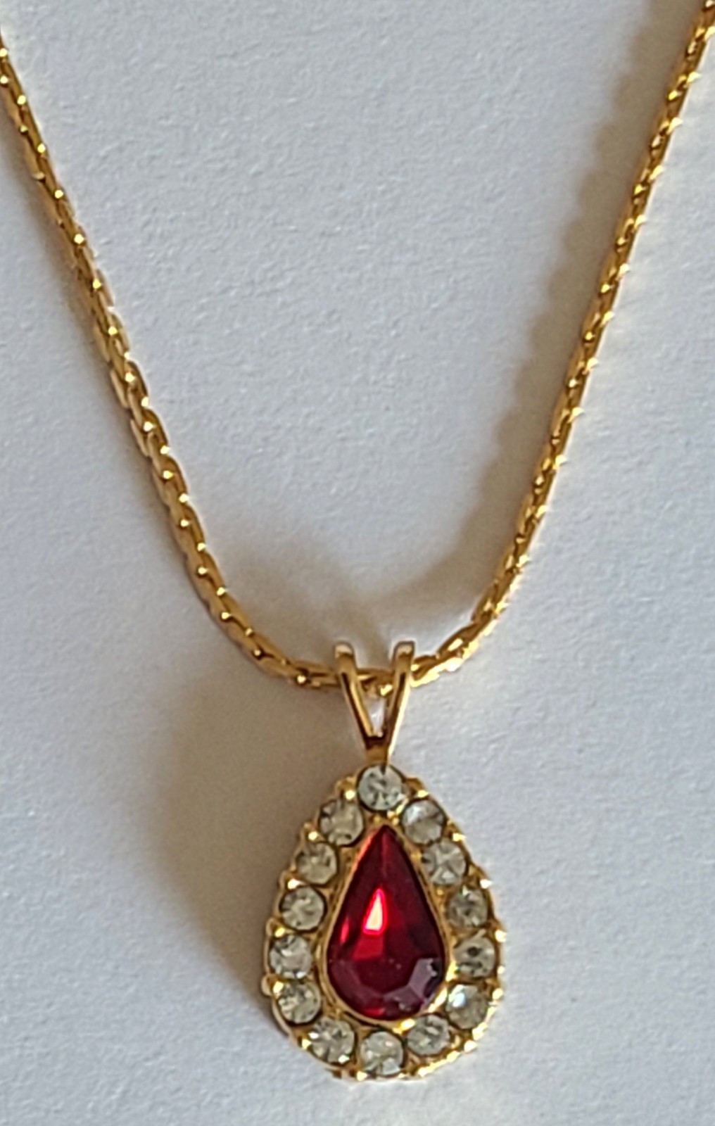 Vintage AVON Gold Tone Teardrop Necklace With Red And White Rinestones