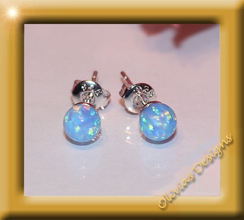 Sterling silver 925 stud earrings with approx 5mm blue opal