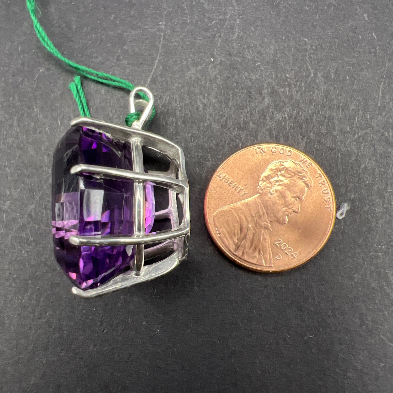 31.69 ct Amethyst and Sterling Silver Pendant. 8.8 Grams