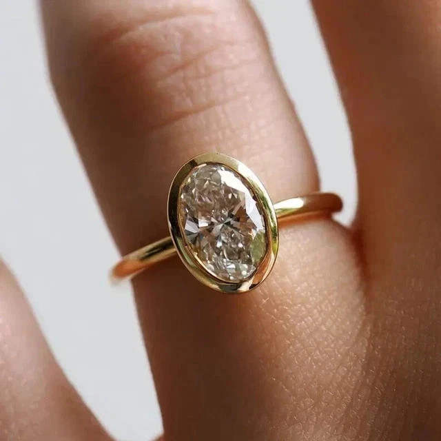 2Ct Oval Cut Lab-Created Diamond Bezel Set Wedding Ring 14k Yellow Gold Plated